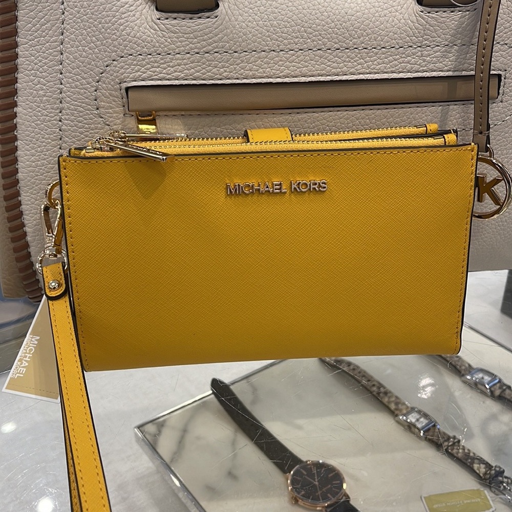 Michael Kors Jet Set Travel Large Double Zip Leather Wristlet phone holder 
NWT